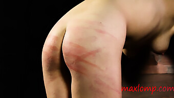 A Young Girl Is Subjected To A Whipping By Her Dominant Mistress