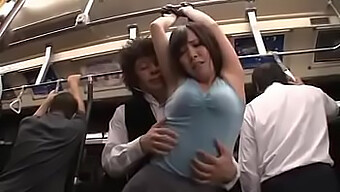 A Japanese Couple Gets Intimate On A Bus